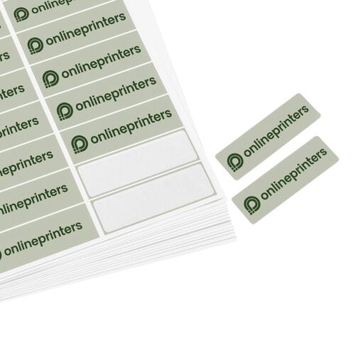 Schwarze Papier-Adressaufkleber auf einem Bogen.