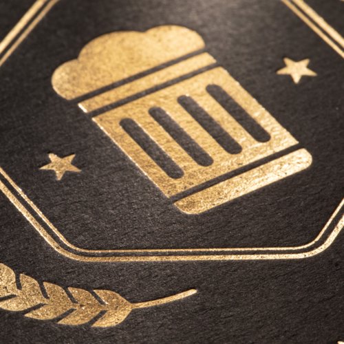 Round beer mat with hot foil stamping.