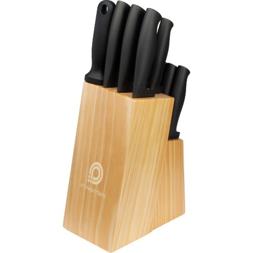 Wooden knife block with slots for knives.