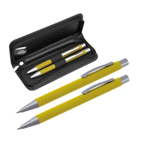 Yellow writing set with ballpoint pen and case.