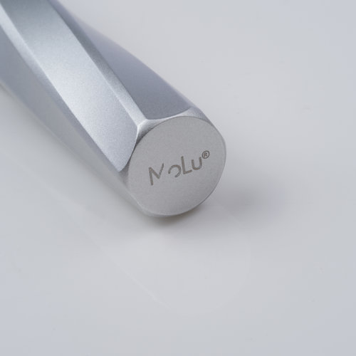 Brass rollerball pen with ink cartridge and cap.