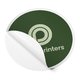 Round sticker with a peel-off backing.