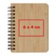 Light wooden notebook with spiral binding.