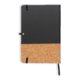 Black cork notebook with elastic band closure.