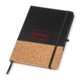 Black notebook with cork detail and elastic band.