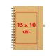 Notebook with spiral binding and elastic band closure.