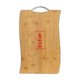 Light bamboo cutting board with handle.