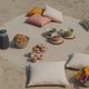 Fabric picnic blanket for outdoor use.
