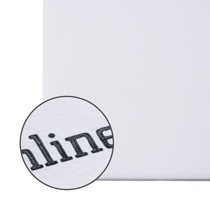 Image Close-up of art print paper with a smooth, white surface and a fine texture.